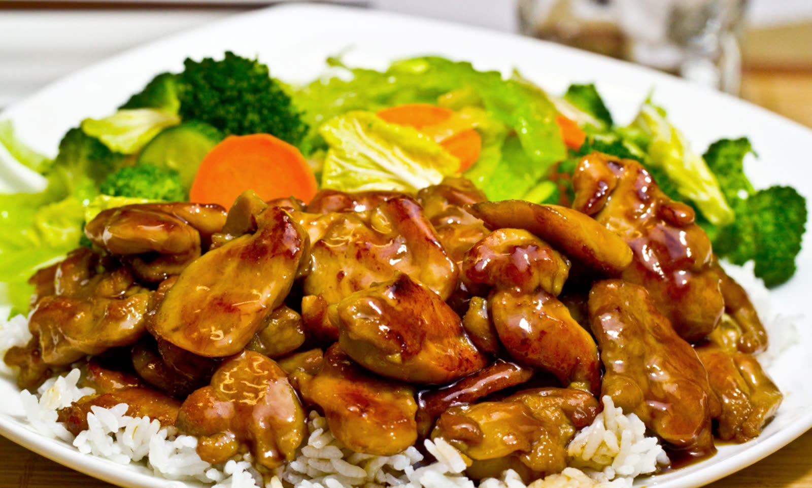 Chicken teriyaki over rice with steamed vegetables